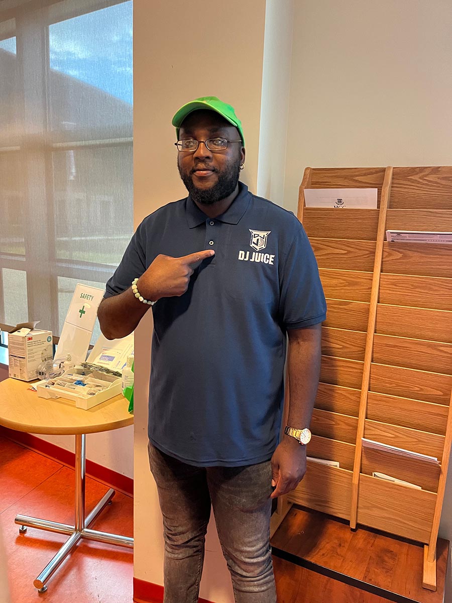 Donavan embroiders logo on shirt